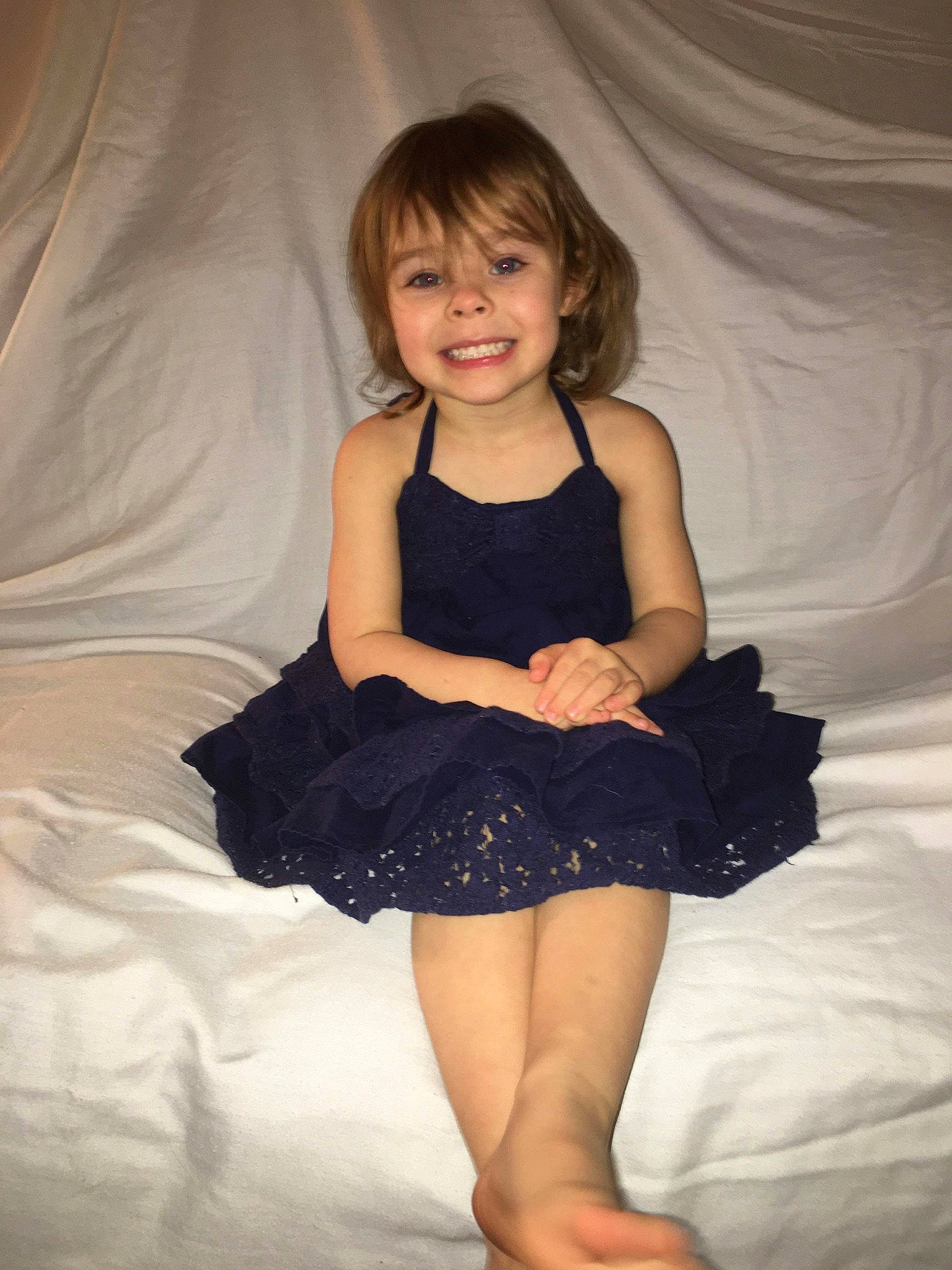 Paisley joined the competition — help win amazing prizes! barefoot, child, child_model, clothing, costume, dress, human_leg, joy, leg, person, sitting, skin, smile, toddler