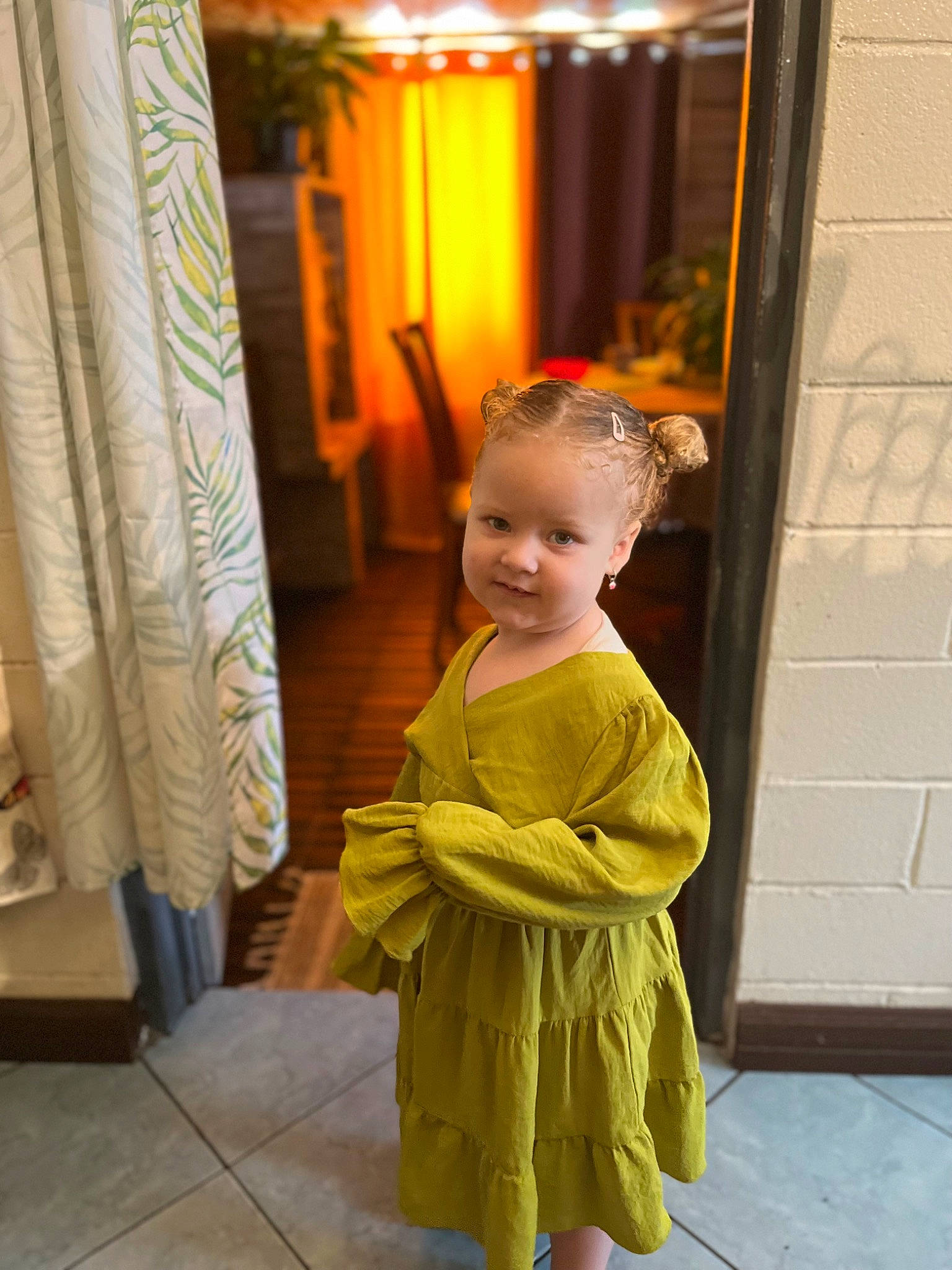 Mya participe au concours pour gagner de l'argent avec cette photo : baby_toddler_clothing, child, costume, curtain, door, event, fashion_design, flooring, formal_wear, fun, magenta, peach, person, room, sitting, sleeve, smile, toddler, tradition, waist