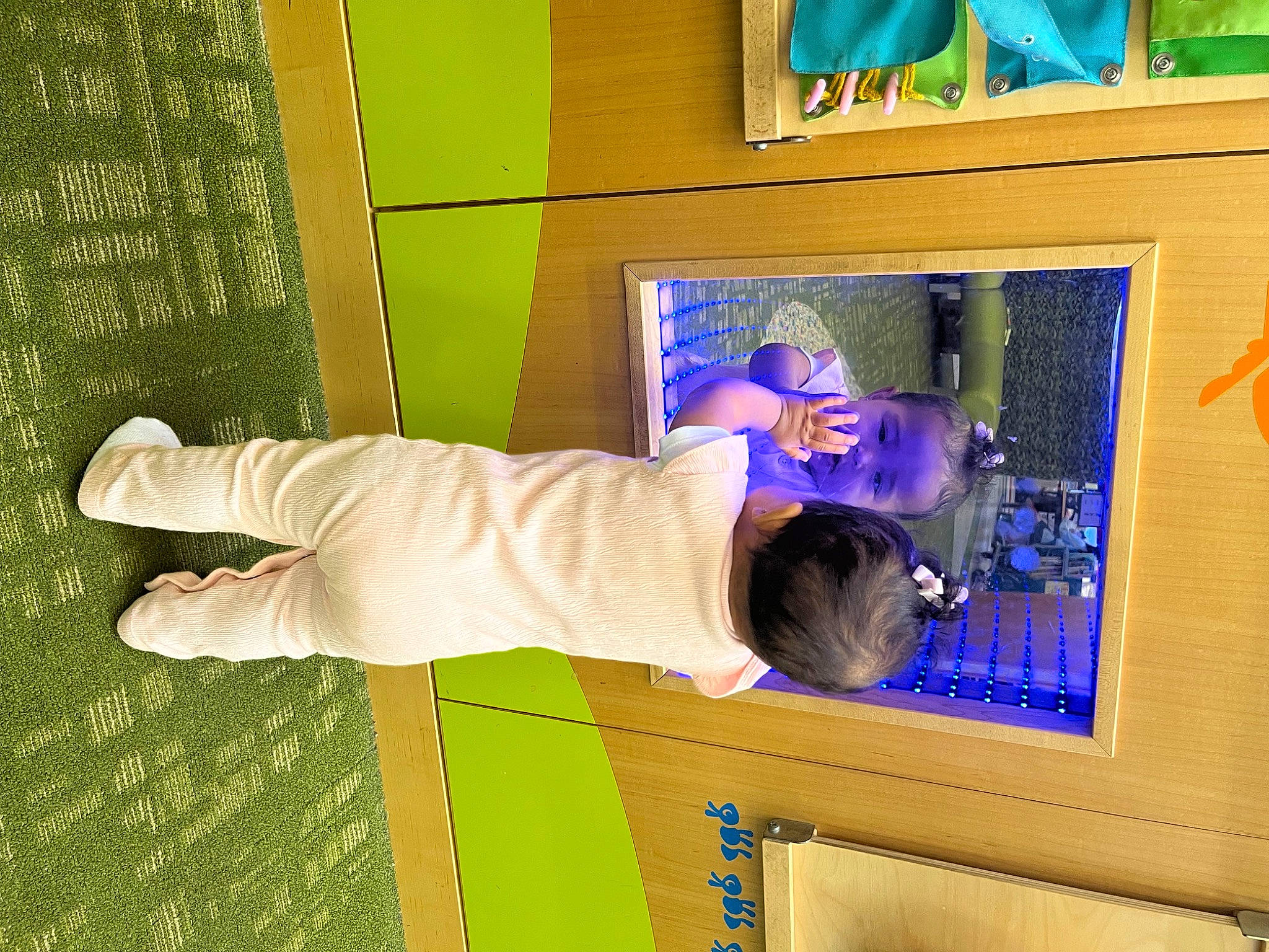 Zy Ava is registered to the contest to win money with this photo: child, door, electric_blue, flooring, fun, green, machine, person, purple, room, toddler