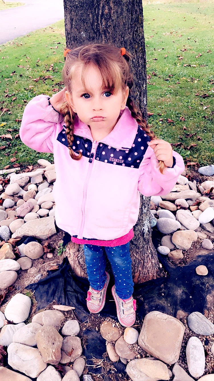 Adalena joined the competition — help win amazing prizes! baby, baby_toddler_clothing, cheek, child, child_model, gravel, pattern, pebble, people_in_nature, person, pink, rubble, toddler, toy