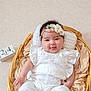 Laïyna participe au concours pour gagner de l'argent avec cette photo : baby, blanket, calendar_block, cheerful, child, closeup, cute, cute_expression, date, flower, headband, indoor, infant, person, portrait, relaxing, smile, soft_texture, white_clothing, wicker_basket