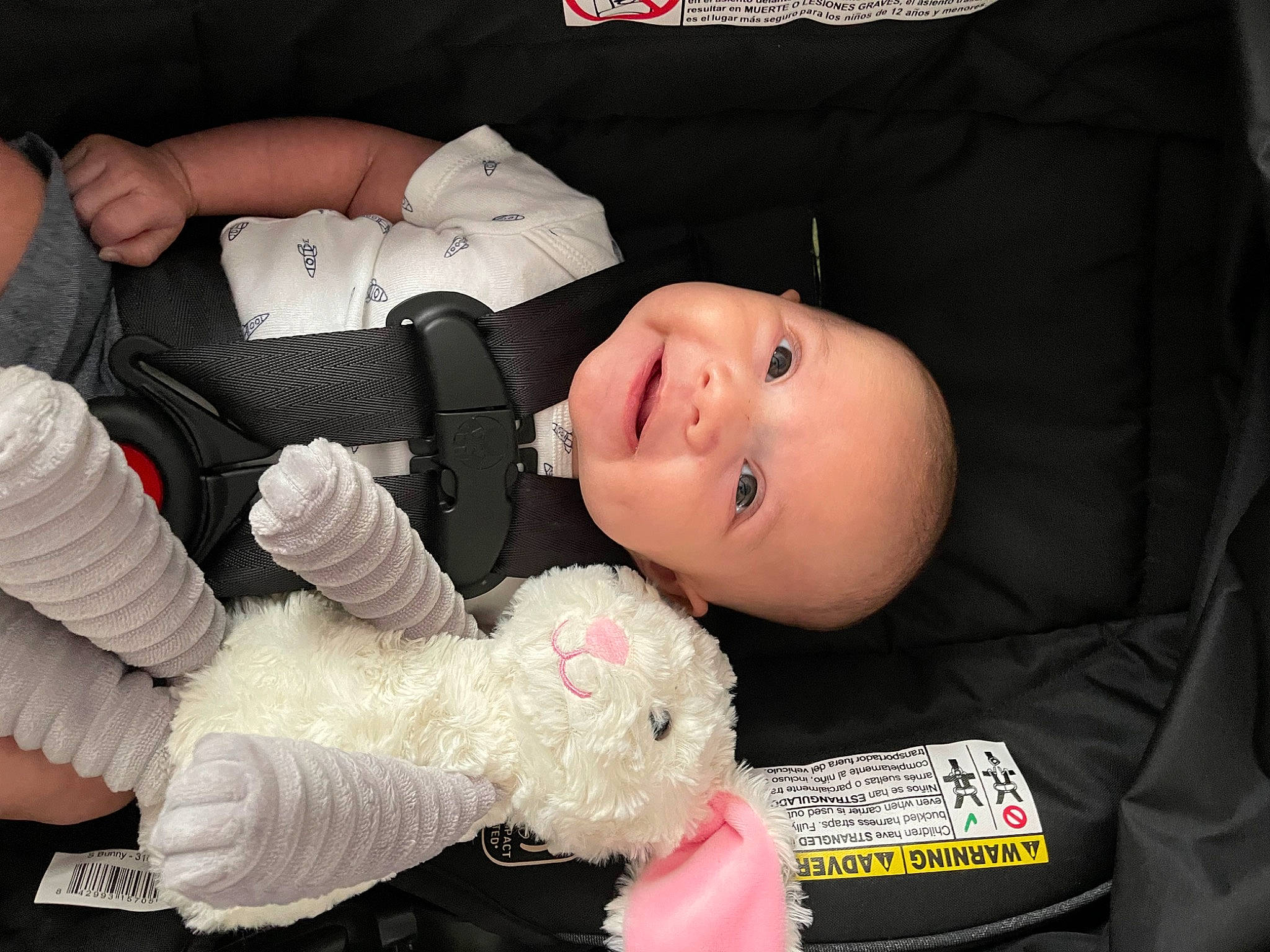 Lucian is registered to the contest to win money with this photo: baby, baby_carriage, baby_products, baby_toddler_clothing, car_seat, cheek, comfort, finger, gesture, lap, nail, person, product, skin, smile, textile, thumb, toddler, toy, white