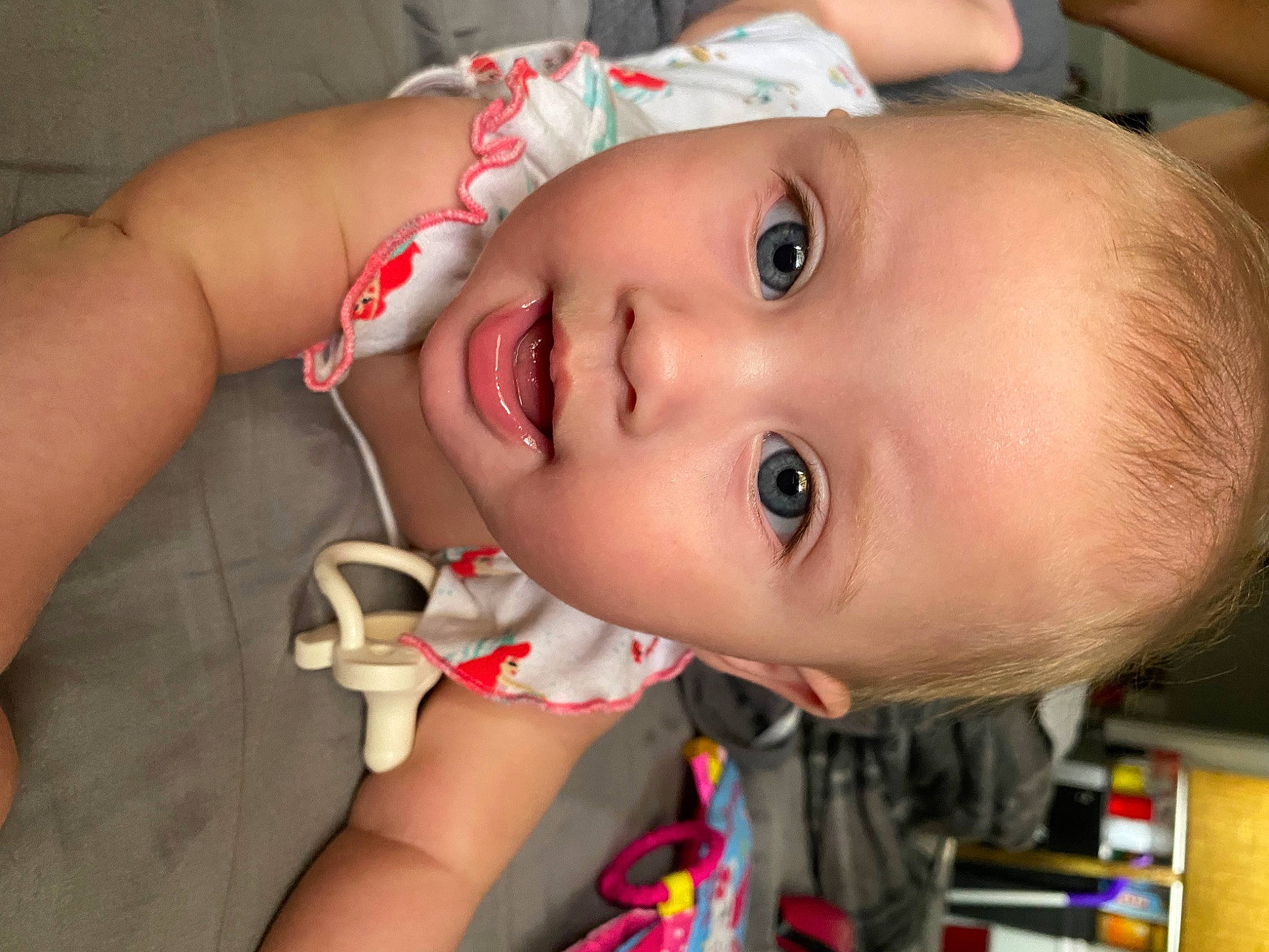 Faith is registered to the contest to win money with this photo: baby, cheek, chin, ear, eye, eyebrow, eyelash, face, facial_expression, happy, human_body, iris, jaw, lip, mouth, neck, nose, person, skin, smile