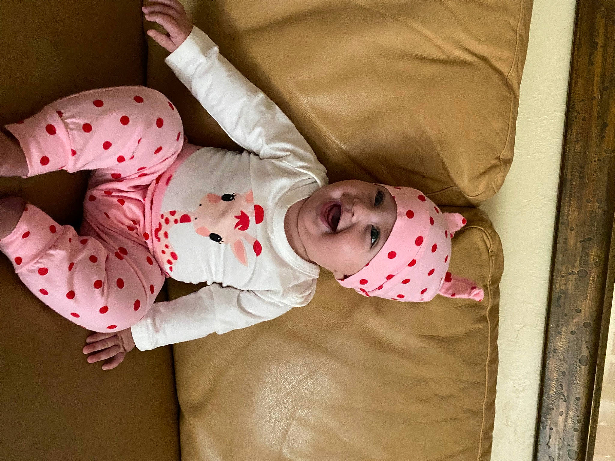 Faith is registered to the contest to win money with this photo: baby, baby_products, baby_safety, baby_sleeping, baby_toddler_clothing, bed, bedding, child, comfort, head, headwear, human_body, linens, mammal, pattern, person, pink, room, skin, sleeve