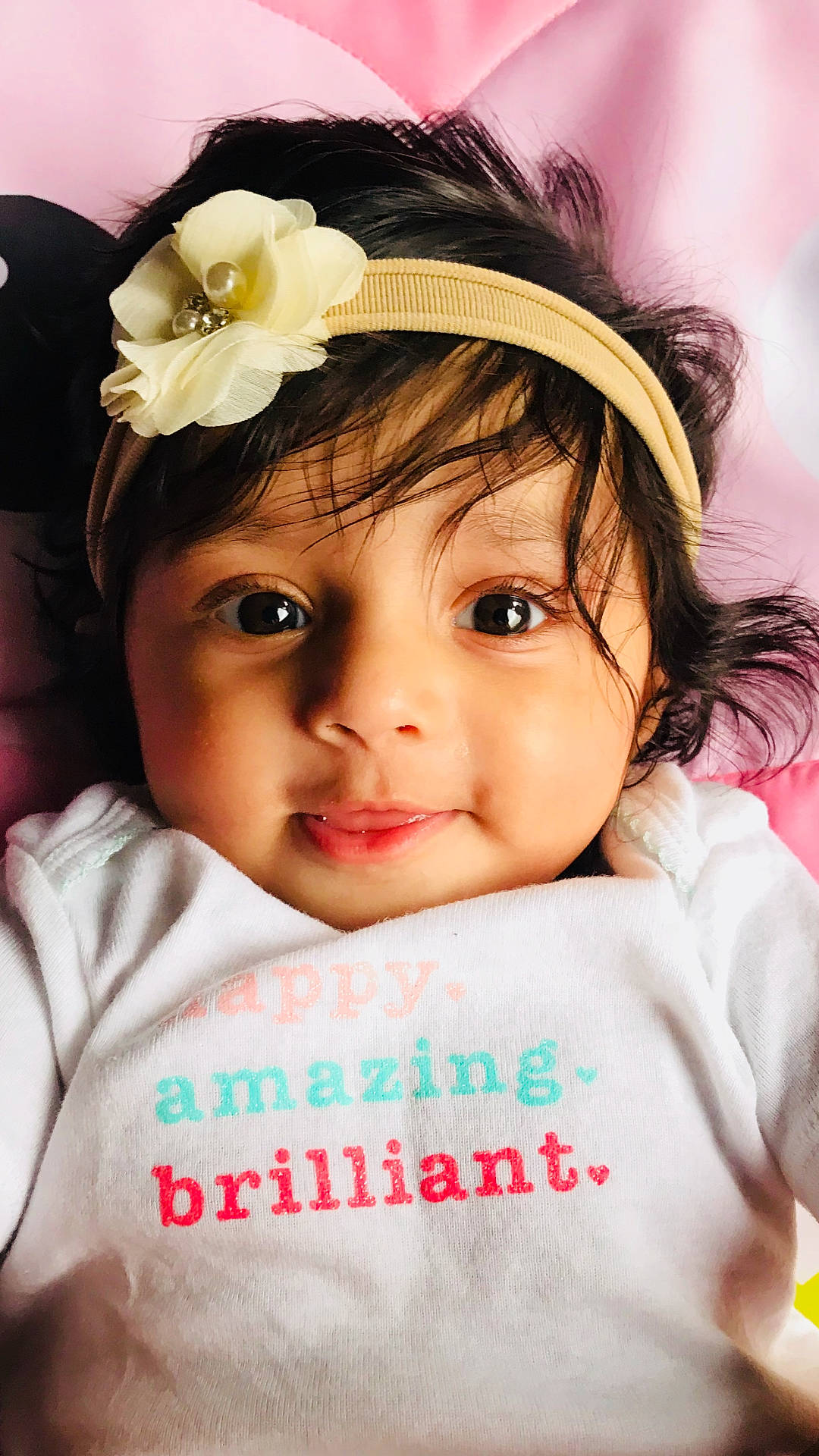 Tiana is registered to the contest to win money with this photo: child, eye, flower, girl, hair_accessory, happiness, infant, person, pink, product, skin, toddler