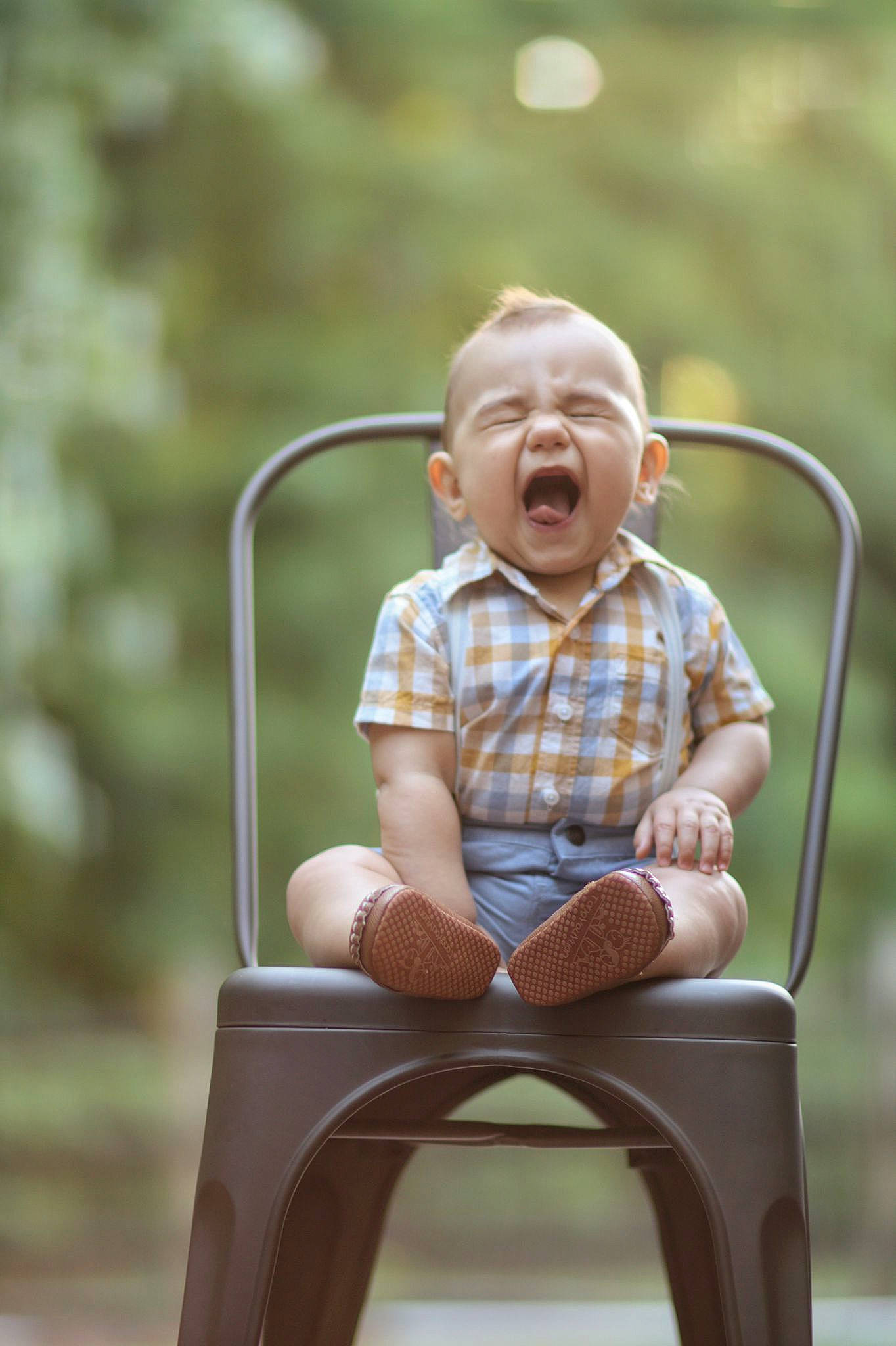 Cristiano is registered to the contest to win money with this photo: arm, baby, baby_toddler_clothing, chair, dress, eye, face, flash_photography, grass, happy, head, jeans, person, plant, skin, smile, t_shirt, table, toddler, tree