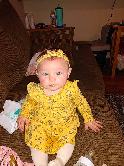 Reign joined the competition — help win amazing prizes! baby, baby_toddler_clothing, chair, cheek, comfort, couch, flooring, foot, fun, hairstyle, head, human_leg, iris, lap, person, sitting, skin, sock, thigh, toddler