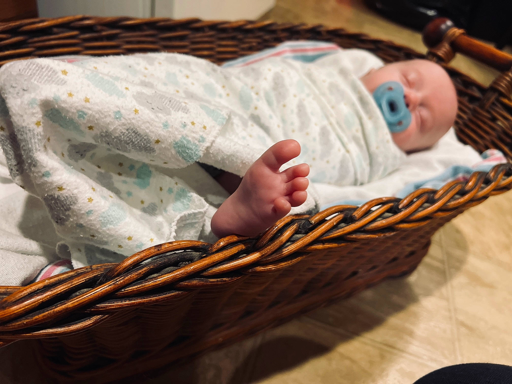 Sawyer is registered to the contest to win money with this photo: baby, baby_products, baby_safety, baby_sleeping, baby_toddler_clothing, basket, child, comfort, elbow, hammock, hardwood, infant_bed, linens, nap, pattern, person, sitting, sleep, toddler, wood