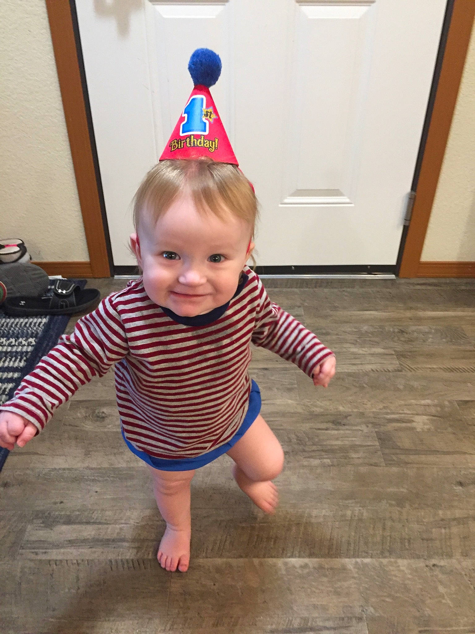 Kaiden is registered to the contest to win money with this photo: baby, baby_products, baby_toddler_clothing, child, floor, flooring, joy, party_supply, person, play, product, standing, toddler