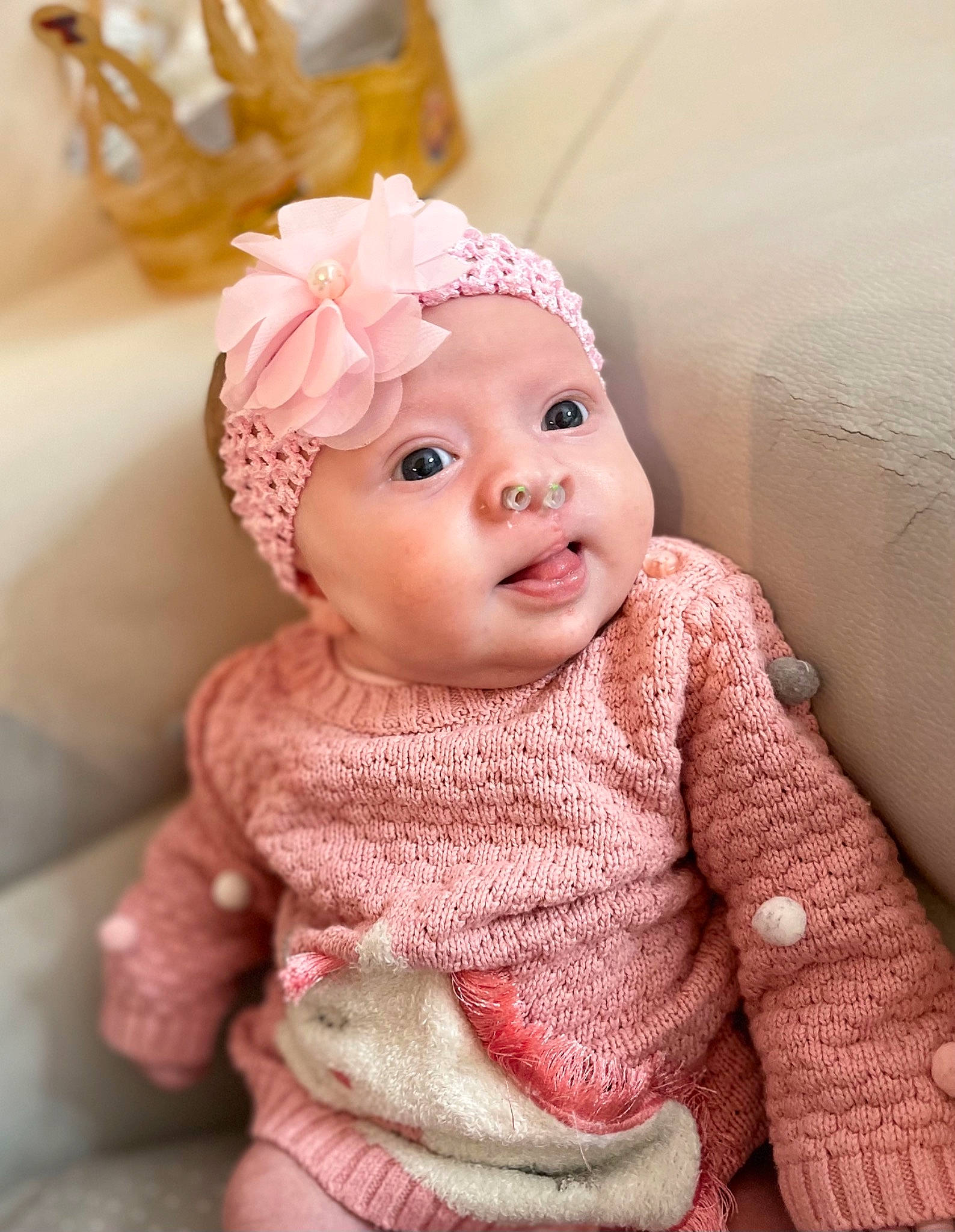 Alyce participe au concours pour gagner de l'argent avec cette photo : baby, baby_toddler_clothing, cap, cheek, chin, dress, eye, eyebrow, eyelash, happy, head, headband, headwear, human_body, iris, knit_cap, lip, peach, person, pink