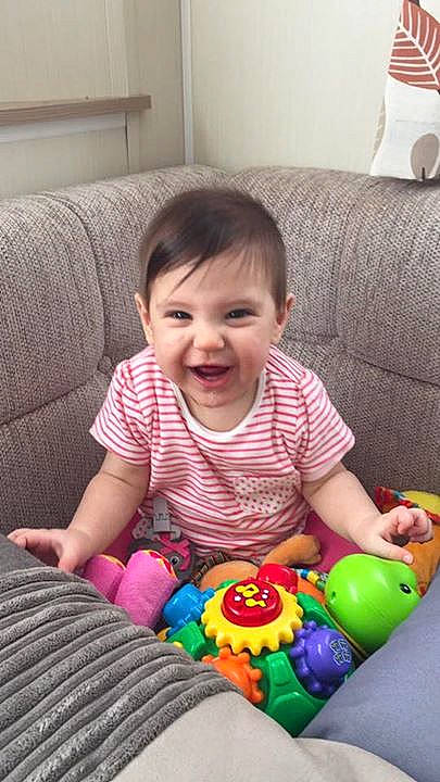 Daisy-mae is registered to the contest to win money with this photo: child, day, human_action, human_positions, infant, person, play, skin, toddler