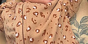Xylah joined the competition — help win amazing prizes! baby, newborn, sleeping, onesie, leopard_print, tattoo, leg, cozy, cute, infant, person, skin, clothing, pattern, closeup, rest, peaceful, small, cute_outfit, relaxing