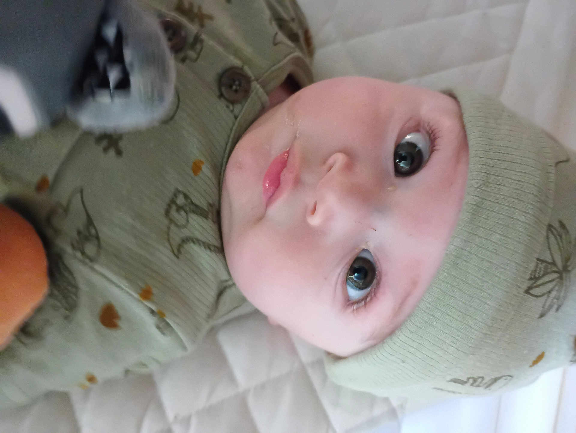 Braylon is registered to the contest to win money with this photo: adorable, baby, beanie, big_eyes, blanket, cheek, close_up, cute, drool, eyelashes, gaze, hat, infant, lying_down, nursery, onesie, portrait, skin, sleepwear, soft_texture