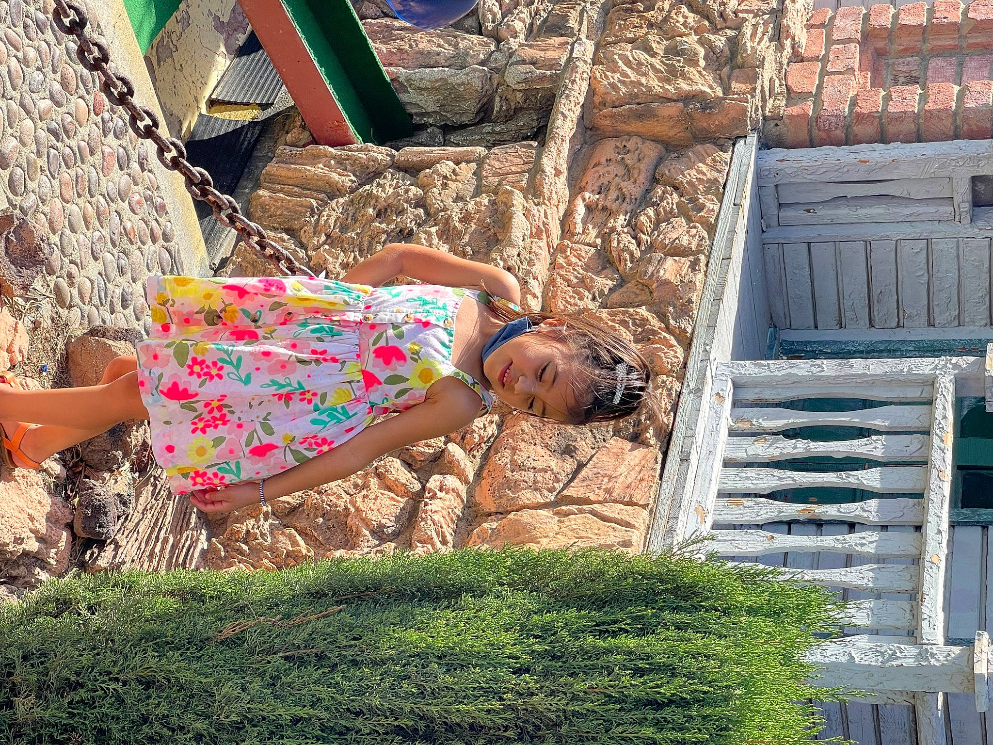 Stella is registered to the contest to win money with this photo: art, barechested, brick, eyewear, fawn, fun, glasses, grass, green, human_leg, landscape, leg, leisure, people_in_nature, person, plant, sitting, sunglasses, thigh, tints_and_shades