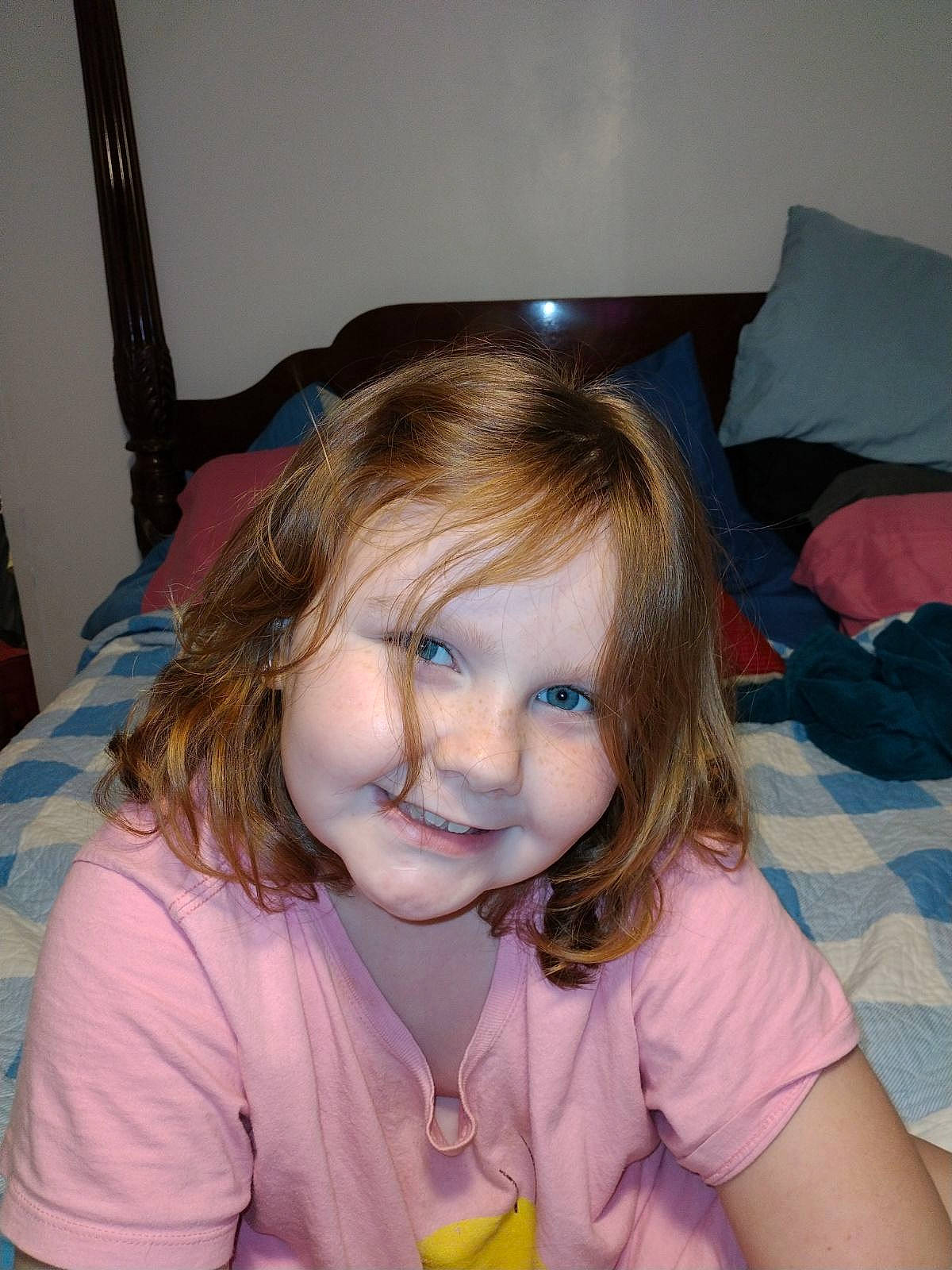 Alyssa is registered to the contest to win money with this photo: blond, brown_hair, chair, cheek, child, comfort, eyebrow, eyelash, face, fun, happy, head, iris, joy, lip, long_hair, mouth, nose, person, sitting