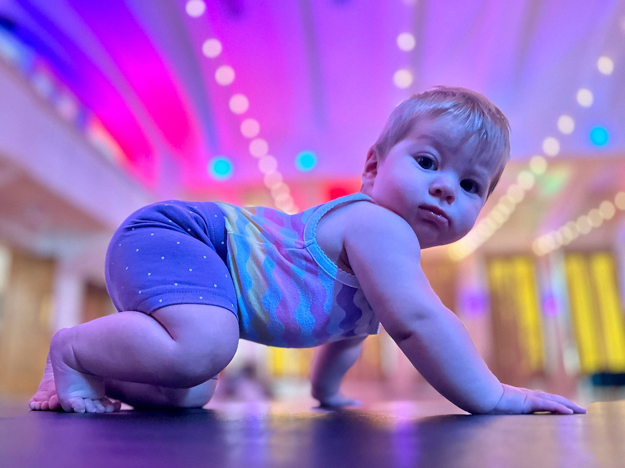 Lyla joined the competition — help win amazing prizes! electric_blue, entertainment, event, flooring, fun, human_body, human_leg, knee, leg, leisure, magenta, performance_art, performing_arts, person, pink, public_event, purple, sportswear, stage, thigh