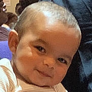 Zion joined the competition — help win amazing prizes! baby, child, smiling, face, head, short_hair, striped_shirt, person, indoor, portrait, cute, closeup, happy, infant, skin, young, human, people, expression, background_blur