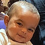 baby, child, smiling, face, head, short_hair, striped_shirt, person, indoor, portrait, cute, closeup, happy, infant, skin, young, human, people, expression, background_blur