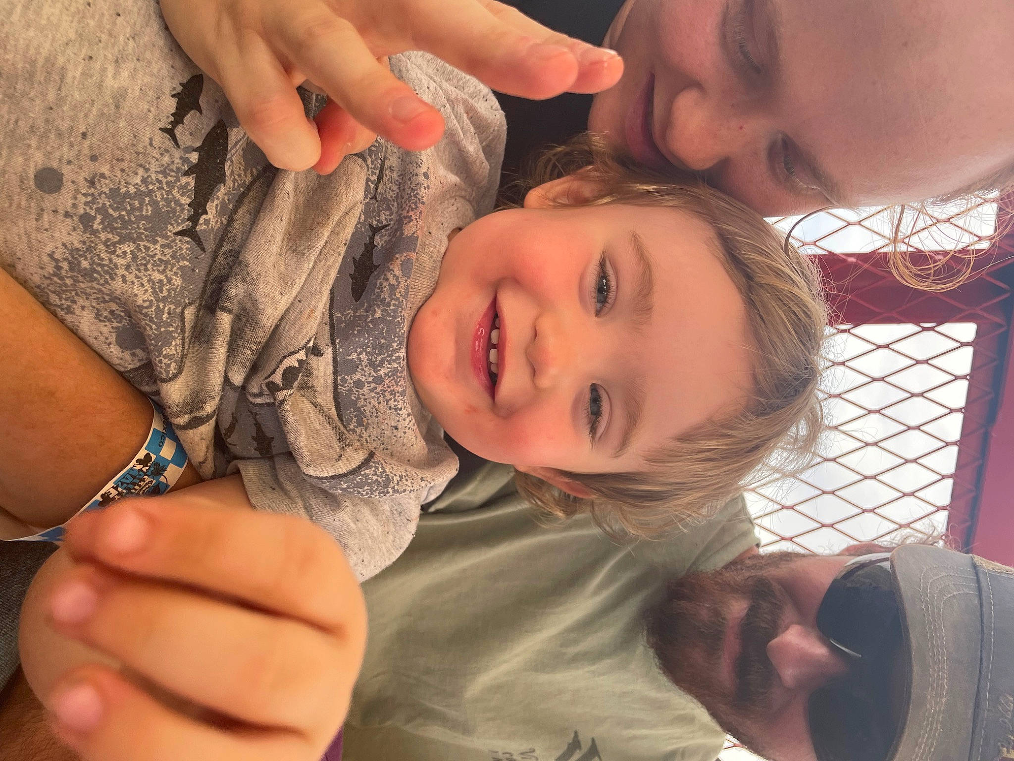 Easton is registered to the contest to win money with this photo: eye, face, facial_expression, finger, gesture, hand, happy, headwear, human_body, interaction, joint, joy, lip, mouth, muscle, nose, organ, person, plant, skin