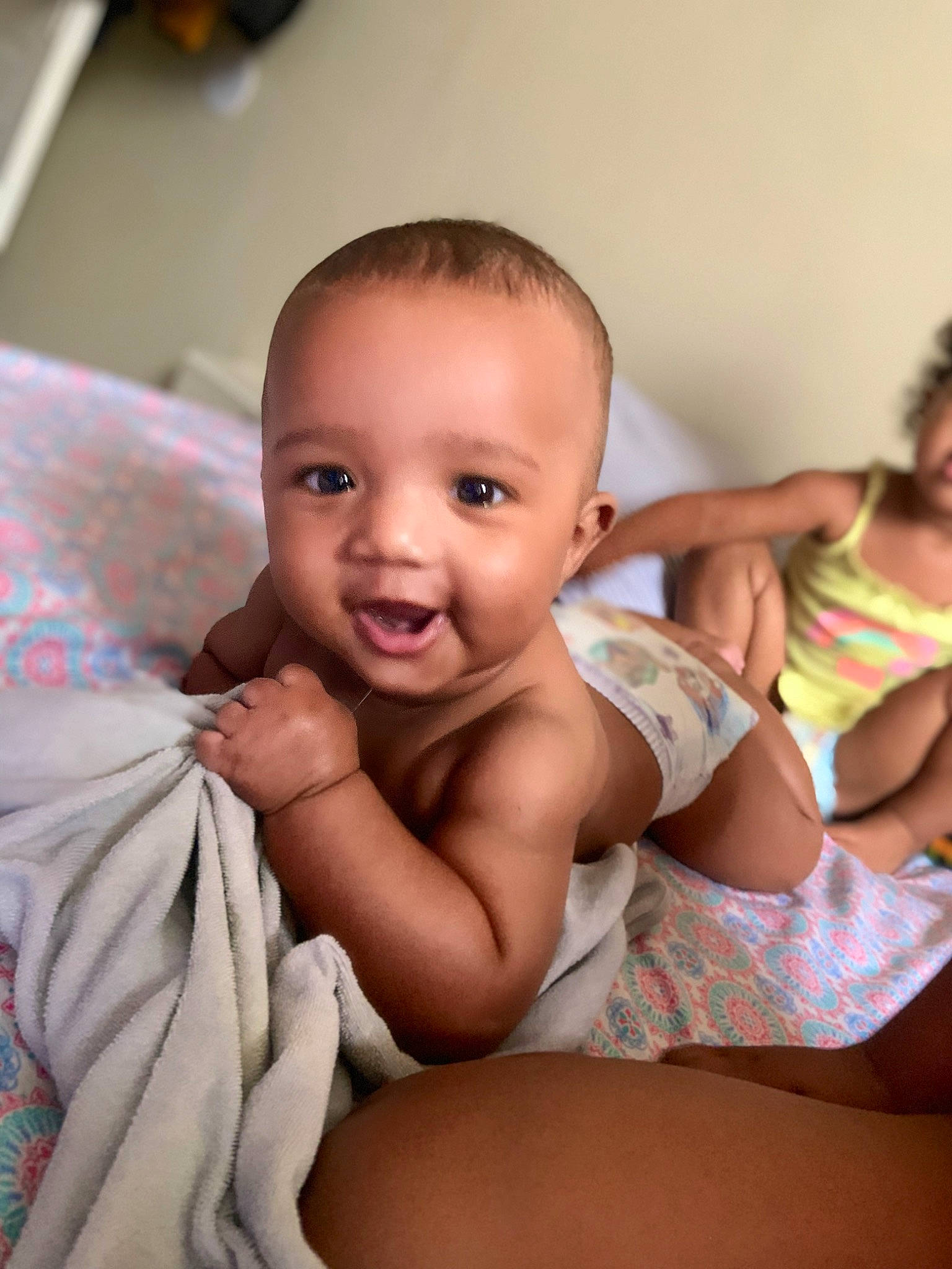 Kamarion is registered to the contest to win money with this photo: abdomen, baby, baby_toddler_clothing, cheek, chest, comfort, flash_photography, gesture, happy, human_body, iris, mouth, neck, nose, person, shoulder, skin, smile, stomach, toddler