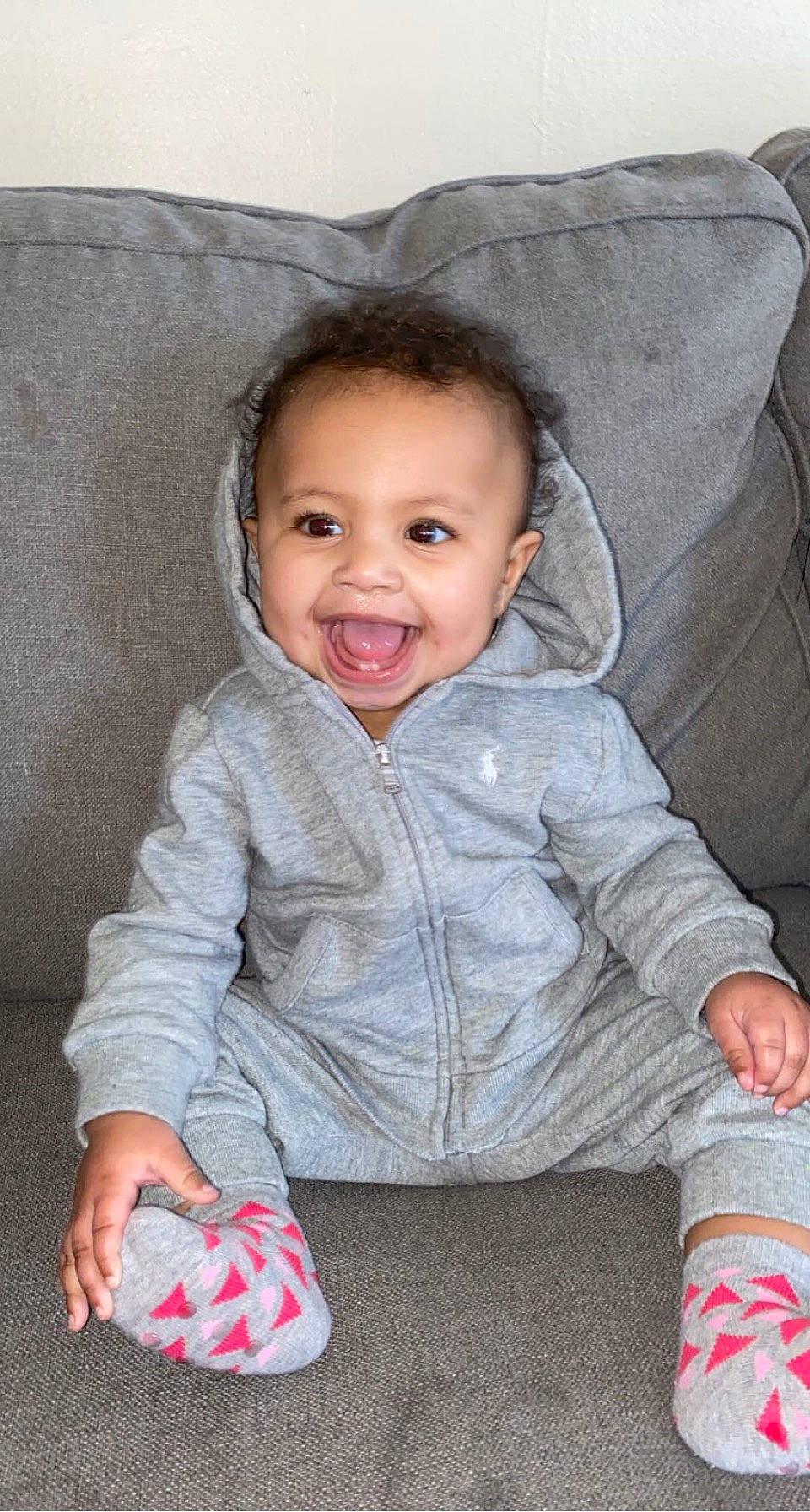 Malayah joined the competition — help win amazing prizes! baby_toddler_clothing, cheek, chin, comfort, eye, face, hairstyle, head, iris, joy, leg, lip, mammal, mouth, nose, outerwear, person, skin, sleeve, smile