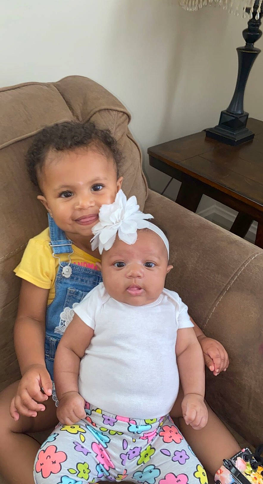 Brayleigh joined the competition — help win amazing prizes! baby, baby_toddler_clothing, cheek, child, comfort, couch, event, eye, face, fun, hairstyle, happy, head, iris, joy, person, pink, skin, sleeve, smile