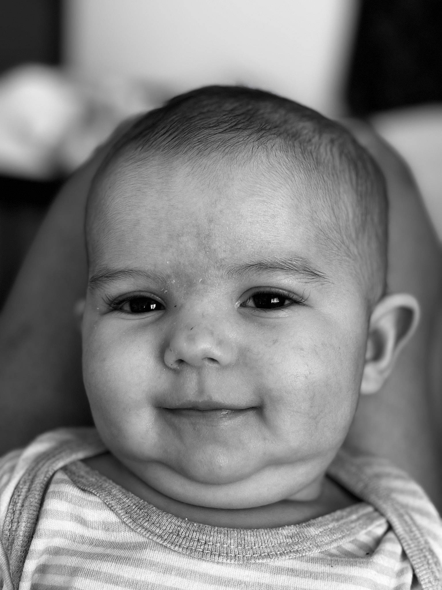 Ezekiel is registered to the contest to win money with this photo: baby, black, cheek, chin, ear, eyebrow, eyelash, flash_photography, forehead, happy, iris, joy, lip, mouth, nose, person, photograph, skin, sleeve, smile