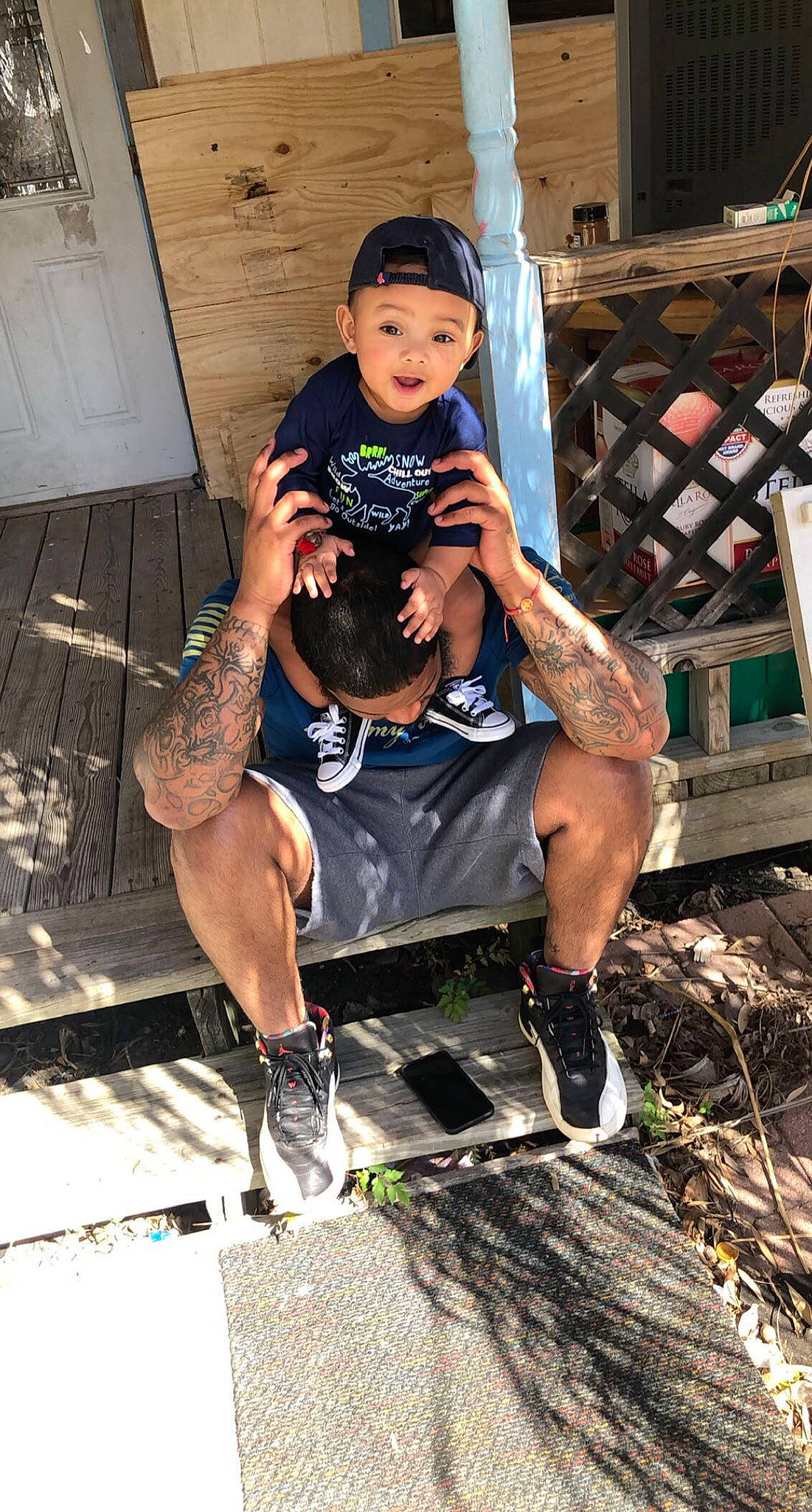 Darius joined the competition — help win amazing prizes! chair, competition_event, flash_photography, fun, hat, headwear, human_leg, knee, leg, leisure, muscle, person, recreation, shoe, shorts, sitting, sneakers, sportswear, street_fashion, t_shirt