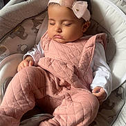 Ayat joined the competition — help win amazing prizes! baby, sleeping, pink_outfit, headband, bow, baby_rocker, cushion, elephant_pattern, infant, cozy, cute, child, soft_lighting, indoors, peaceful, resting, adorable, portrait, young_child, clothing