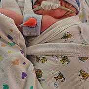 Clayton joined the competition — help win amazing prizes! newborn, baby, hospital, medical_tubes, hat, blanket, swaddle, patient, infant, healthcare, cute, sleeping, premature, monitoring, nursery, heart_pattern, hospital_bed, pediatric, soft_fabric, resting