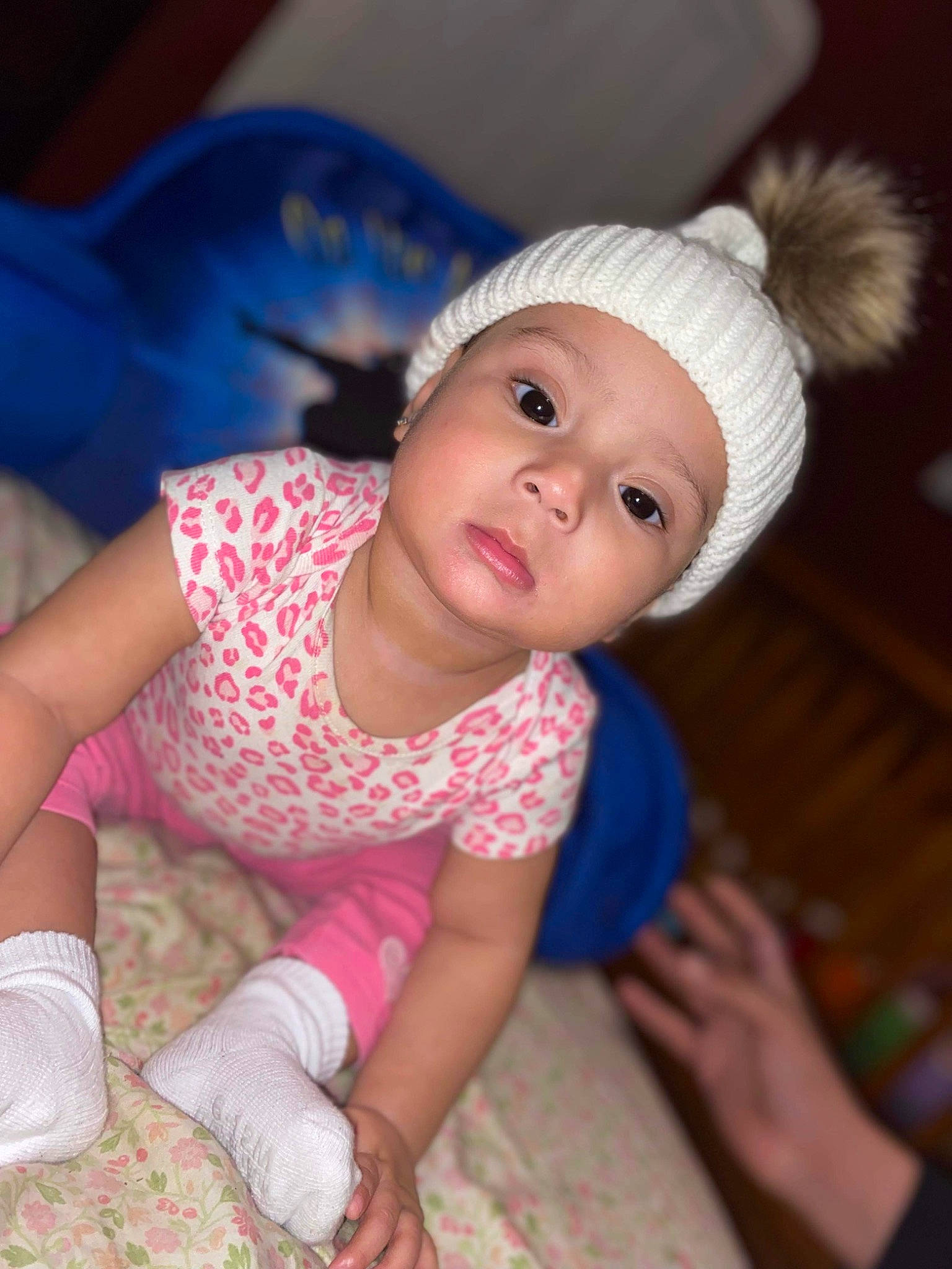 Naomi is registered to the contest to win money with this photo: baby, baby_toddler_clothing, cap, cheek, child, eye, face, facial_expression, flash_photography, fun, happy, head, headwear, iris, lip, nose, person, pink, skin, standing