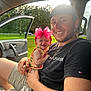 Kayslynn is registered to the contest to win money with this photo: baby, child, man, smile, happy, car, seat, window, door, greenery, outdoor, sunlight, cap, bow, clothing, portrait, family, holding, casual, people