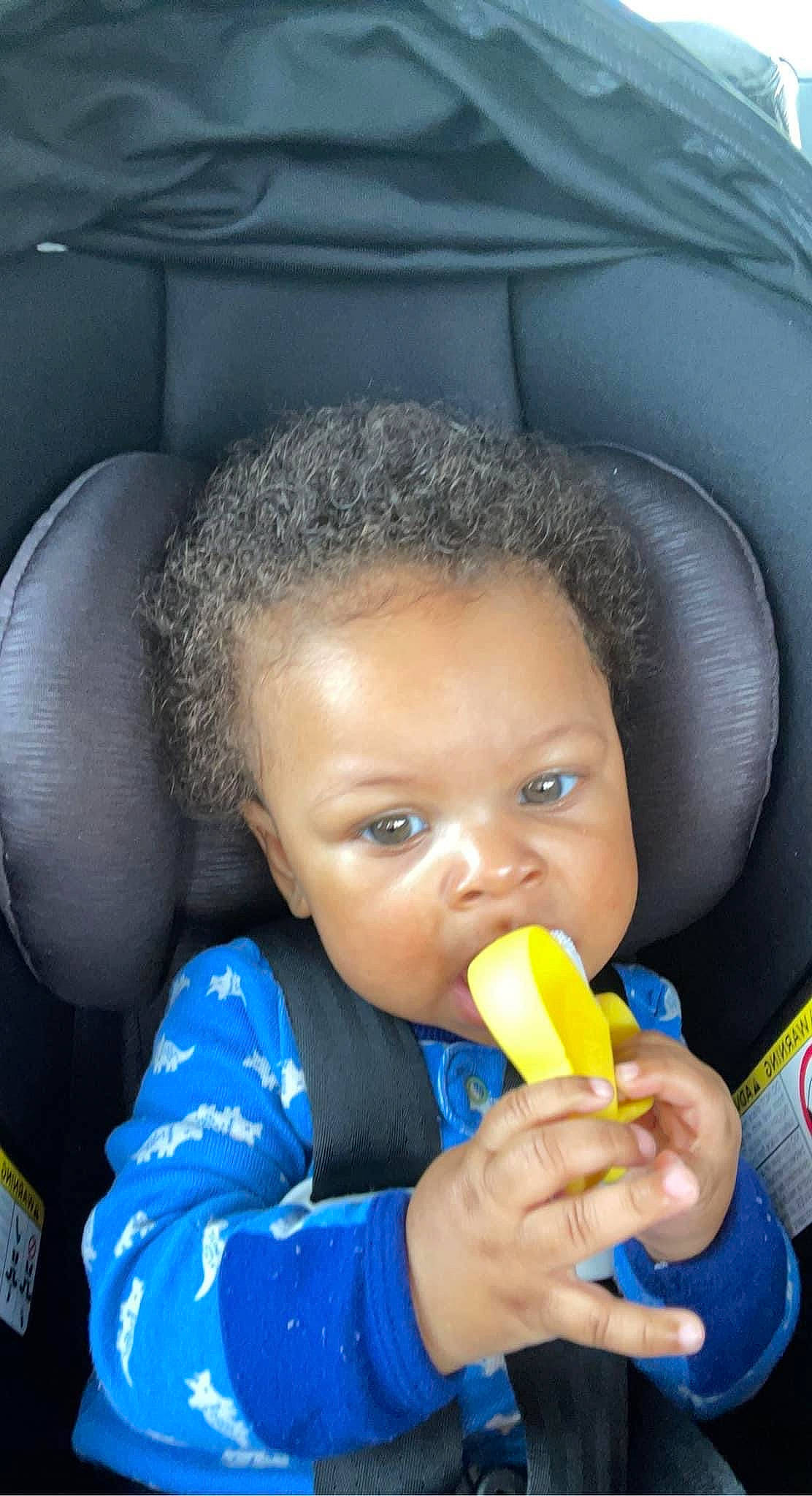 Zyaire joined the competition — help win amazing prizes! afro, baby_products, biting, black, car_seat, cheek, child, drinkware, fun, happy, lip, mouth, nose, organ, person, plastic, snapshot, sweetness, thumb, toddler
