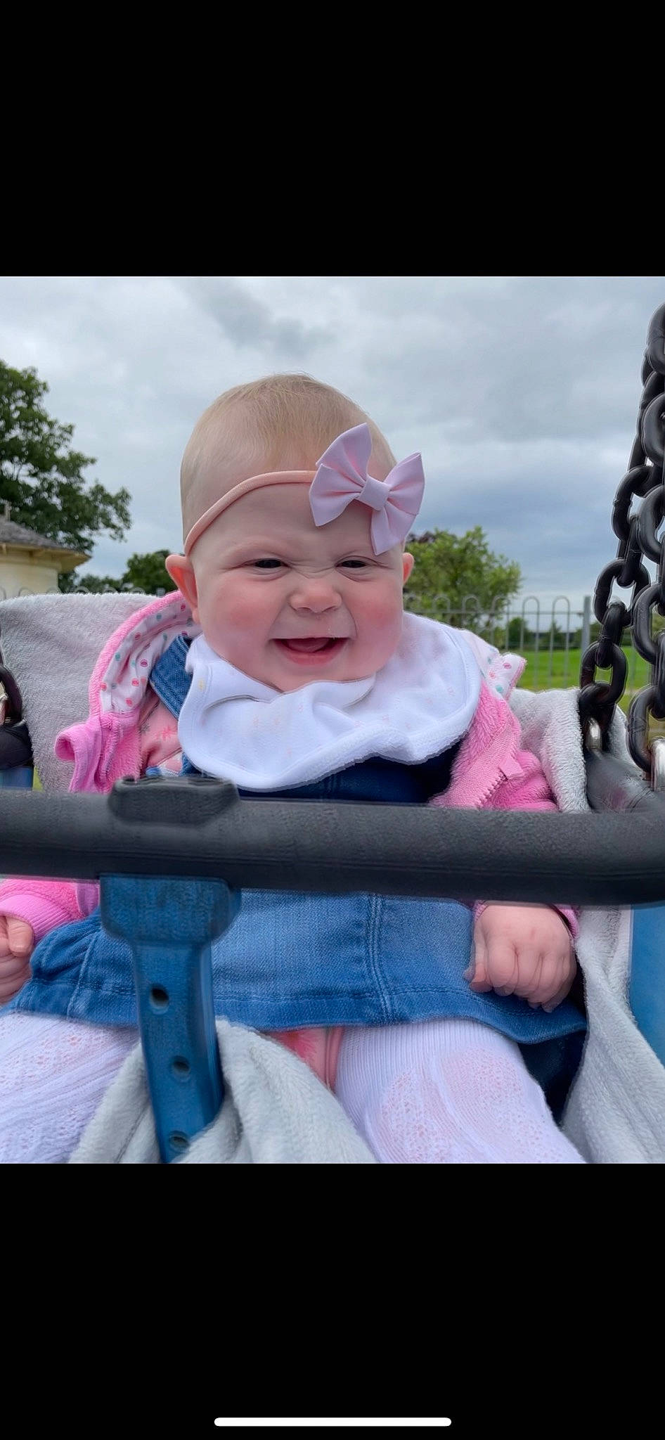 Olivia is registered to the contest to win money with this photo: baby, baby_carriage, baby_toddler_clothing, cloud, cool, fun, grass, hairstyle, happy, hat, headwear, leisure, person, pink, plant, product, recreation, skin, sky, smile