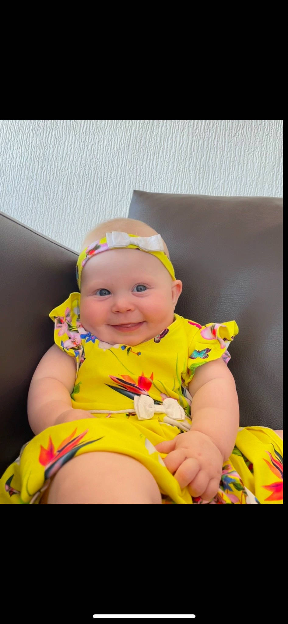 Olivia joined the competition — help win amazing prizes! baby, baby_products, baby_toddler_clothing, cheek, child, eye, fashion_accessory, flash_photography, fun, happy, headwear, joy, leisure, magenta, person, purple, recreation, sitting, skin, smile