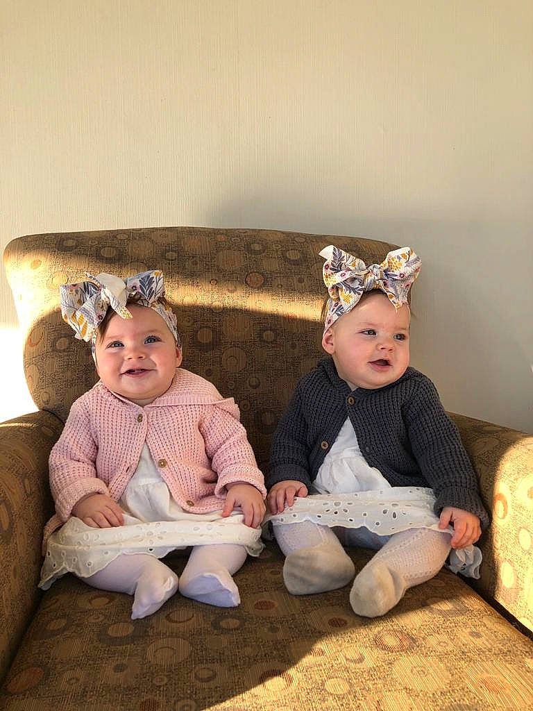 Ruth joined the competition — help win amazing prizes! baby, baby_toddler_clothing, child, comfort, couch, family, fashion_accessory, flash_photography, flooring, fun, grass, happy, headband, headwear, jewellery, joy, lap, person, room, sitting