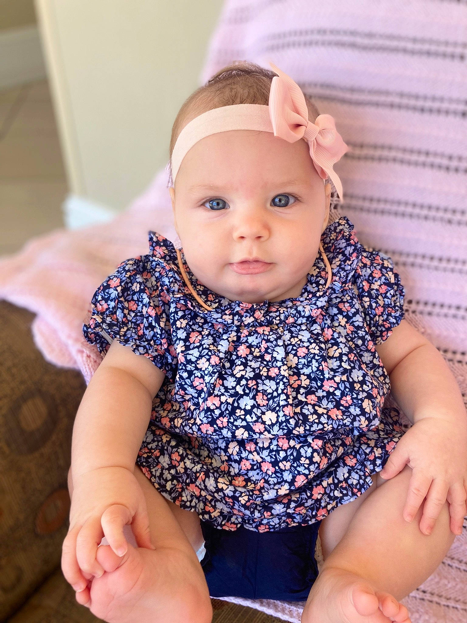 Hadassah is registered to the contest to win money with this photo: baby, baby_products, baby_toddler_clothing, cap, cheek, child, collar, electric_blue, eye, fashion_accessory, finger, hand, happy, head, headwear, iris, neck, pattern, person, skin