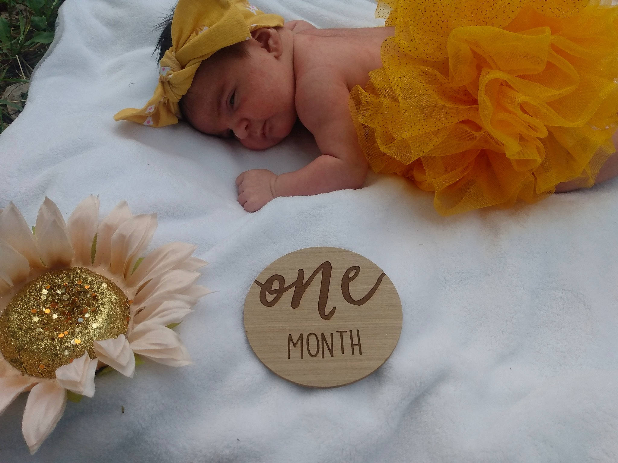 Adelyn is registered to the contest to win money with this photo: baby, baby_sleeping, baby_toddler_clothing, bedding, bedtime, blanket, child, comfort, fashion_accessory, flower, font, happy, headgear, headwear, jewellery, linens, nap, person, petal, product