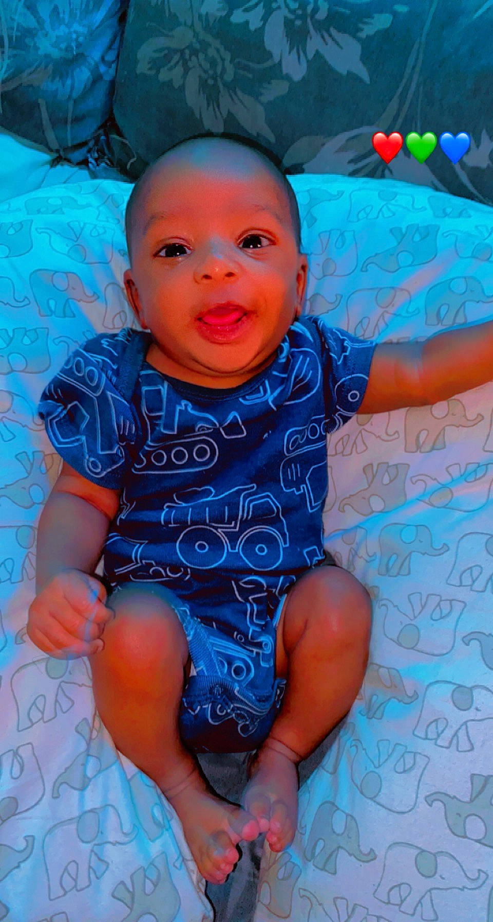 Jamarion is registered to the contest to win money with this photo: arm, azure, baby_toddler_clothing, blue, cheek, eye, facial_expression, hairstyle, happy, head, human_body, iris, joint, mouth, organ, person, product, purple, skin, smile