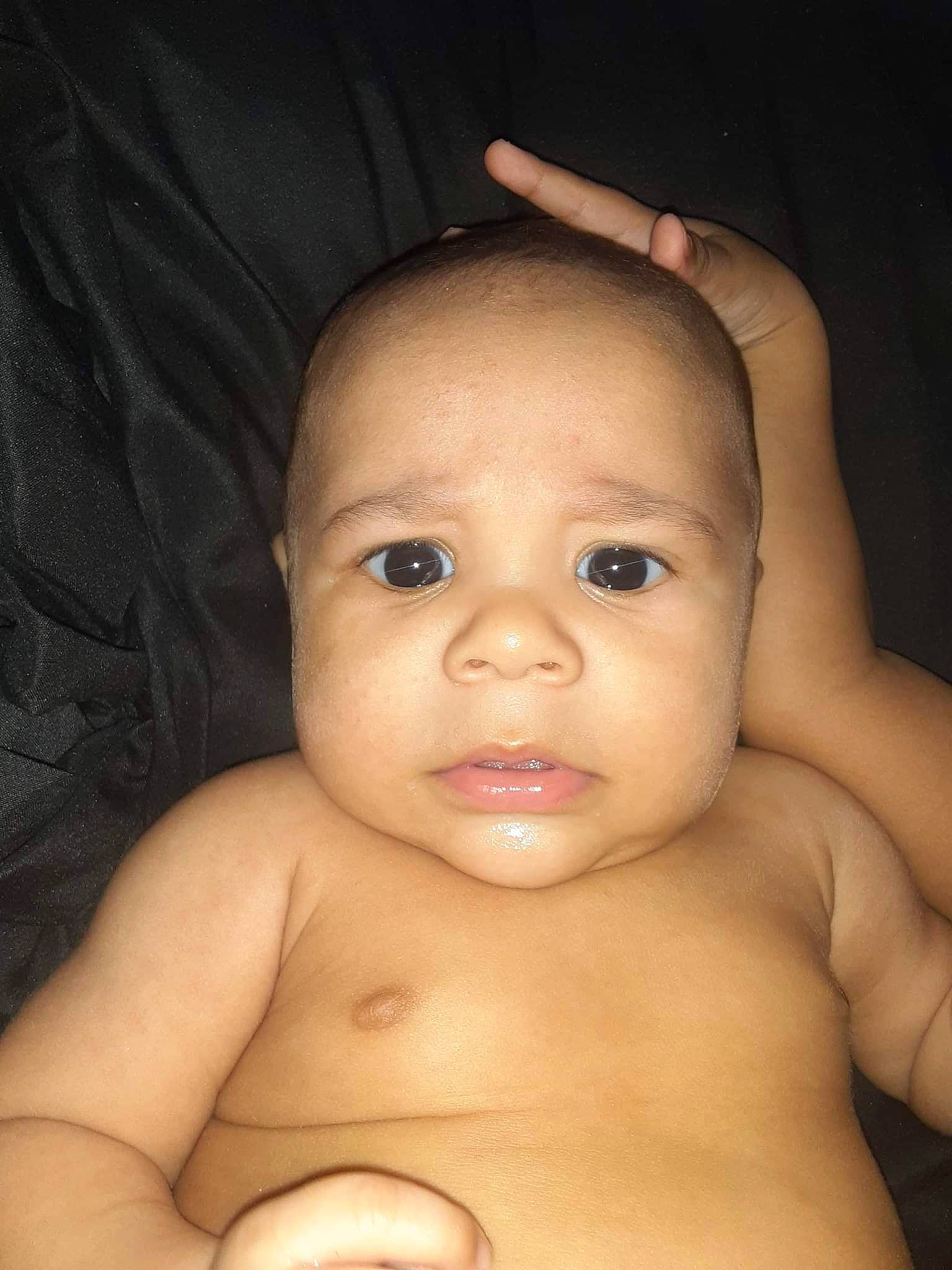 Malachai is registered to the contest to win money with this photo: arm, cheek, chin, ear, eye, eyebrow, eyelash, forehead, hair, head, human_body, iris, jaw, leg, lip, mouth, neck, nose, person, skin