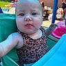 arm, baby, backyard, chair, child, eyes, face, family_gathering, head, infant, leopard_print, outdoor, patterned_clothing, photography, poolside, portrait, sitting, summer, turquoise, wide_eyed