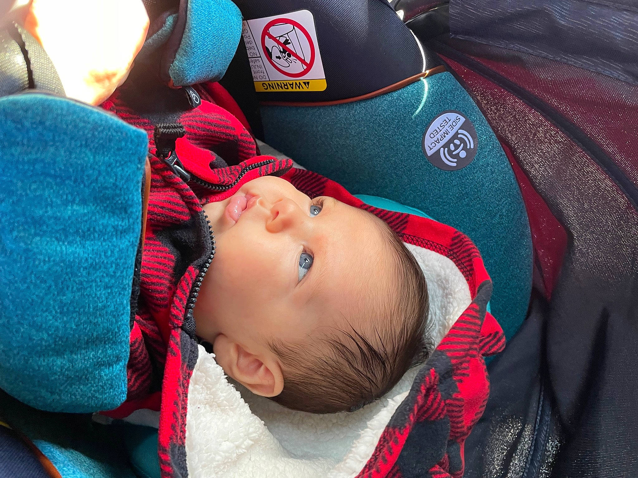 Mark is registered to the contest to win money with this photo: baby, baby_carriage, baby_products, baby_safety, baby_sleeping, baby_toddler_clothing, baseball_cap, beanie, cap, carmine, child, comfort, eye, fashion_accessory, happy, nap, person, personal_protective_equipment, red, sleep