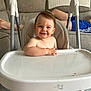 Teddy joined the competition — help win amazing prizes! baby, high_chair, smile, indoor, living_room, couch, person, child, happy, furniture, foot, clothing, tray, seat, skin, hair, crumbs, relaxed, home, portrait