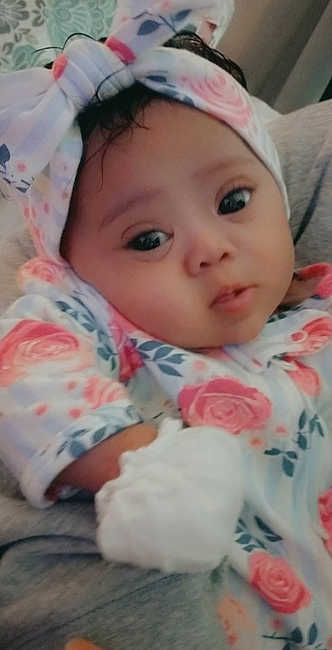 Kimorah is registered to the contest to win money with this photo: baby, baby_toddler_clothing, cap, cheek, eye, eyebrow, eyelash, facial_expression, happy, head, headgear, headwear, iris, lip, mouth, nose, organ, person, pink, skin