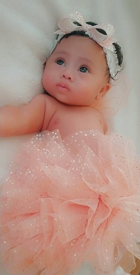 Kimorah joined the competition — help win amazing prizes! baby, baby_toddler_clothing, bathing, cheek, dress, embellishment, eye, eyelash, finger, hand, happy, headgear, headwear, iris, lip, mouth, person, pink, skin, textile