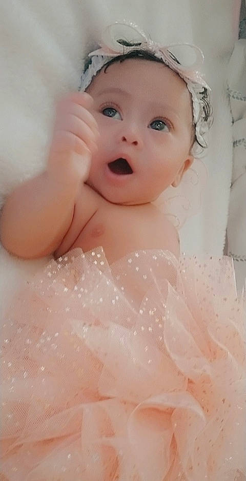 Kimorah joined the competition — help win amazing prizes! baby_toddler_clothing, cap, cheek, dress, embellishment, eye, eyelash, face, finger, flash_photography, happy, head, headgear, human_body, iris, lip, person, pink, skin, smile