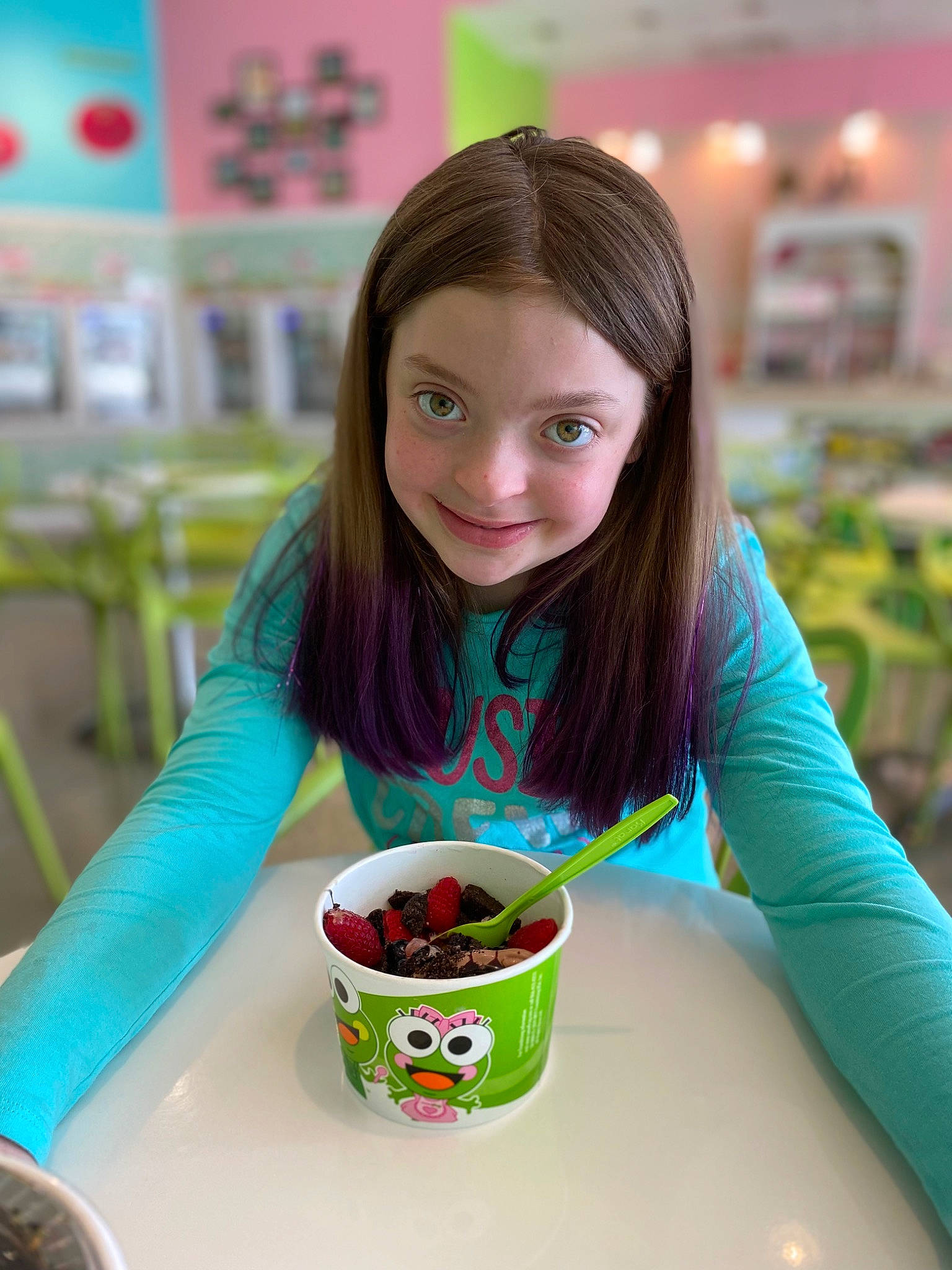 June is registered to the contest to win money with this photo: brown_hair, child, comfort_food, cuisine, dish, dress, eyelash, food, fun, hair, happy, joy, leisure, person, photograph, recreation, room, sitting, skin, smile