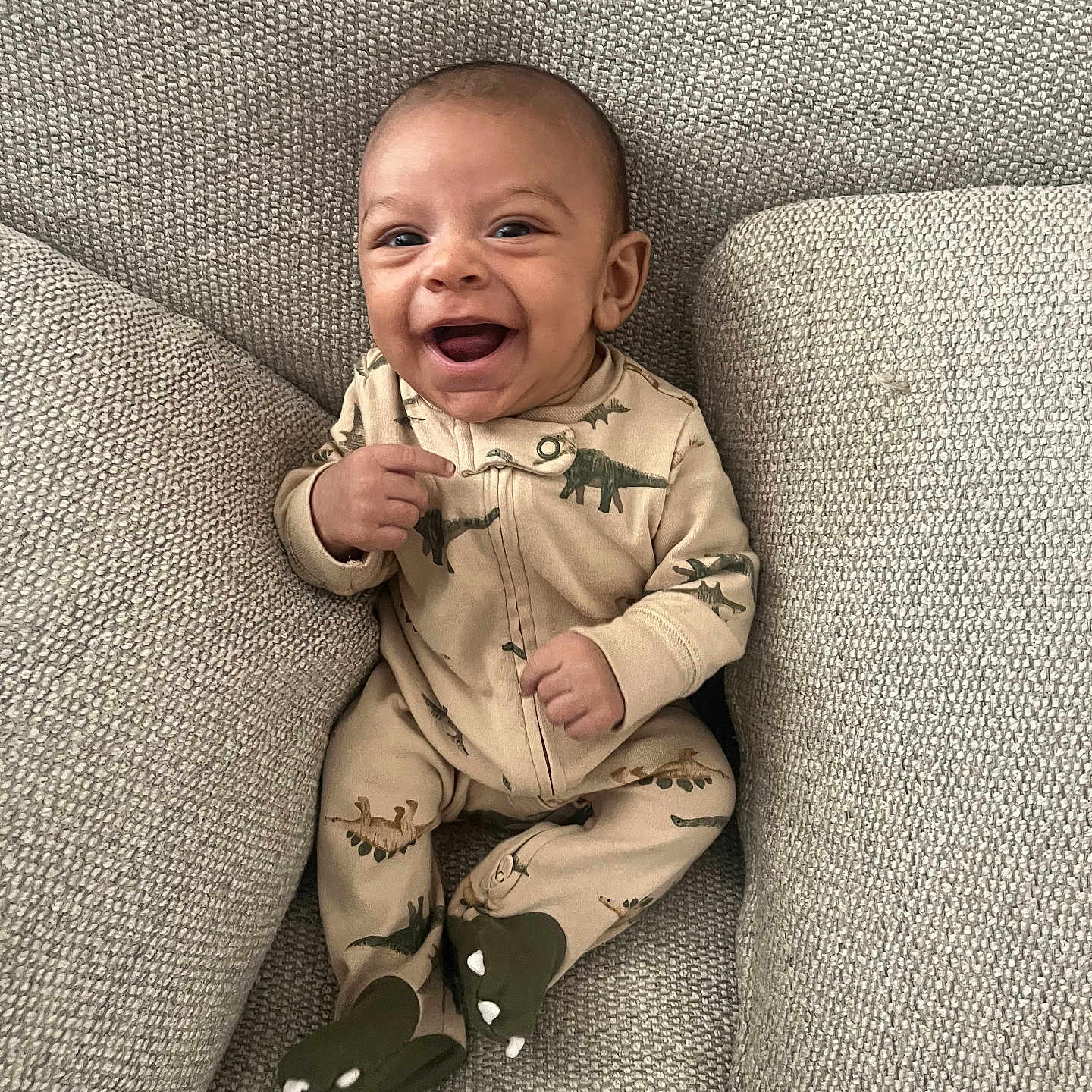 Gatlyn is registered to the contest to win money with this photo: baby, babylaughing, couch, cushion, face, furniture, happy, head, homedecor, laughing, person, photography, portrait, sitting, smile