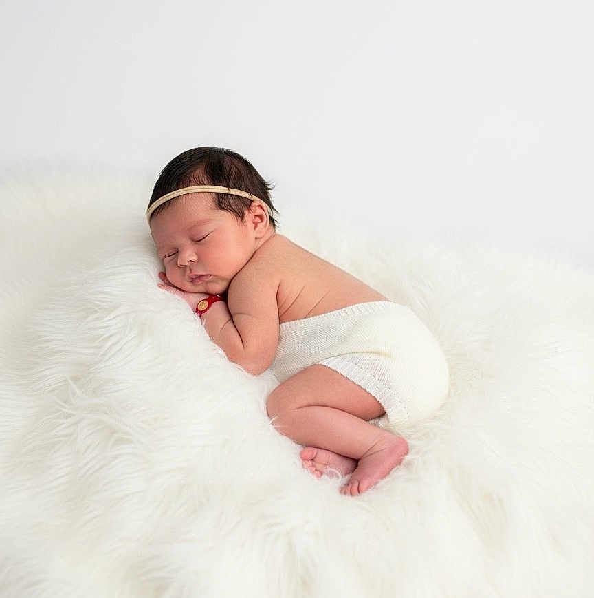 Arleth joined the competition — help win amazing prizes! newborn, baby, sleeping, infant, headband, diaper, white_blanket, soft_texture, peaceful, cute, small, curled_up, skin, portrait, resting, indoors, tender, adorable, child, young