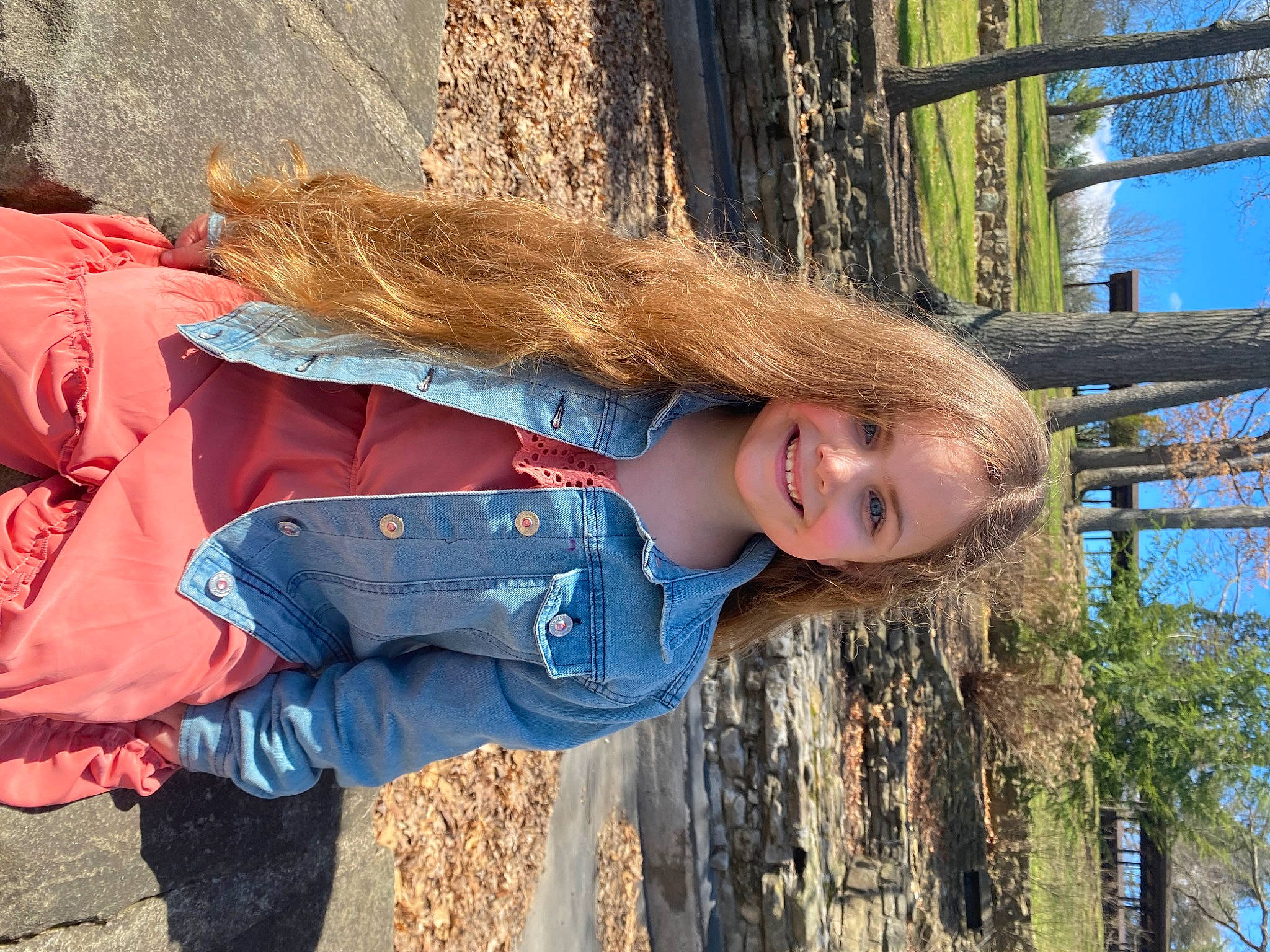 Rayna is registered to the contest to win money with this photo: child, denim, electric_blue, fun, fur, grass, happy, joy, leisure, mammal, people_in_nature, person, sky, smile, spring, toddler, travel, tree, trunk, vacation